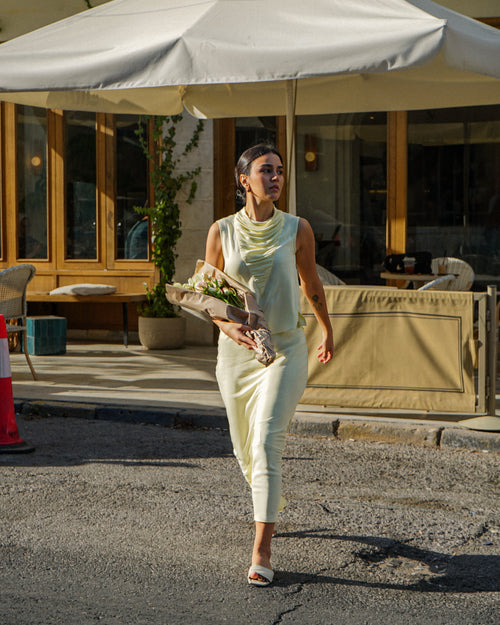 Bias skirt and Shanbar top styled together in butter yellow rayon, summer collection
